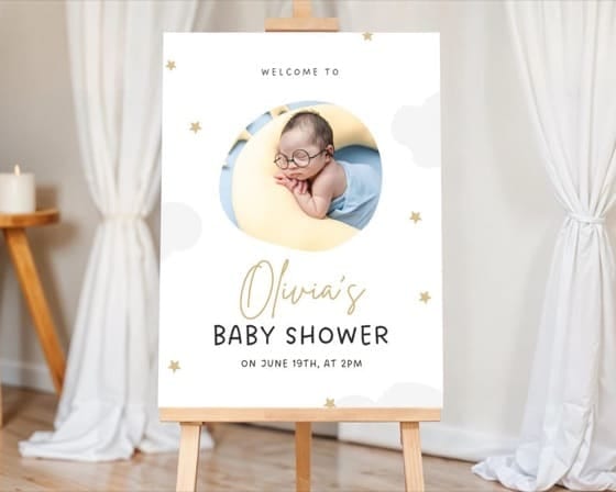 Baby shower welcome sign photo collage on an easel at a party